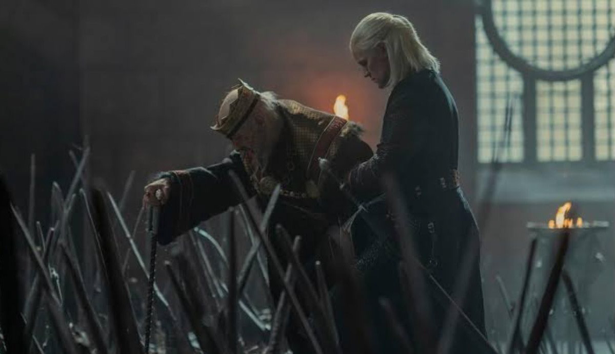 Viserys I Targaryen being helped onto the Iron Throne by Daemon Targaryen